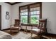 Inviting sitting area with comfortable chairs, natural light, and hardwood floors at 5430 N Washington Blvd, Indianapolis, IN 46220