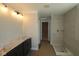 Unfinished bathroom featuring shower and vanity at 5517 Sienna Ct, Brownsburg, IN 46112