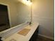Bathroom vanity with modern fixtures and ample countertop space at 5517 Sienna Ct, Brownsburg, IN 46112