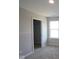 Bedroom with plush carpeting, neutral walls, and walk in closet at 5517 Sienna Ct, Brownsburg, IN 46112