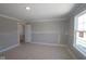 Unfinished bedroom showcases a window at 5517 Sienna Ct, Brownsburg, IN 46112