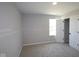 Bedroom with plush carpeting, neutral walls, and walk in closet at 5517 Sienna Ct, Brownsburg, IN 46112
