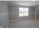Unfinished bedroom showcases a window with a view at 5517 Sienna Ct, Brownsburg, IN 46112