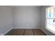 Bedroom with light gray walls, awaiting flooring and final touches at 5517 Sienna Ct, Brownsburg, IN 46112