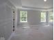 Unfinished bedroom features bright windows at 5517 Sienna Ct, Brownsburg, IN 46112