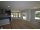Open-concept living area combines kitchen and living room, awaiting flooring and final touches at 5517 Sienna Ct, Brownsburg, IN 46112