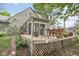 Inviting back deck with ample seating, perfect for outdoor dining and entertaining at 6210 Mckinley Ct, Indianapolis, IN 46220