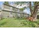 Expansive backyard featuring lush green lawn and mature trees, offering a serene outdoor space at 6210 Mckinley Ct, Indianapolis, IN 46220