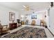 Open basement living area with unique carpeting and comfortable seating at 6210 Mckinley Ct, Indianapolis, IN 46220