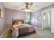Inviting bedroom with a plush bed, soft lighting, and decorative details at 6210 Mckinley Ct, Indianapolis, IN 46220