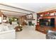Cozy living room with stone fireplace, built-in shelves, and neutral decor at 6530 Lowanna Way, Indianapolis, IN 46220