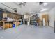Spacious garage with epoxy floor, offering ample room for storage and projects at 6789 Passage Cir, Indianapolis, IN 46250