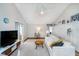 Bright living room featuring vaulted ceilings and modern decor at 6789 Passage Cir, Indianapolis, IN 46250