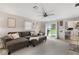 Inviting living room with a view of backyard with sliding door at 679 Bark Dr, Anderson, IN 46011