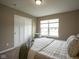 Bedroom featuring a bright window, a closet, and a bed at 695 Overcup St, Westfield, IN 46074
