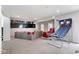 Finished basement offers media area and basketball arcade for Gathering fun at 7022 Tamarind Ct, Indianapolis, IN 46236