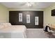 Bedroom showcasing contemporary decor, a work space, and a soft color palette at 7022 Tamarind Ct, Indianapolis, IN 46236