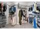Walk-in closet with organized shelving, rods, and ample storage space at 7022 Tamarind Ct, Indianapolis, IN 46236