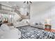 Bright living room featuring hardwood floors, a staircase, and modern décor at 7022 Tamarind Ct, Indianapolis, IN 46236
