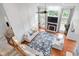 Bright, open living room with fireplace, high ceilings, and stylish decor at 7022 Tamarind Ct, Indianapolis, IN 46236