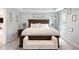 Spacious main bedroom with a large bed, soft carpet, and bright natural lighting at 7022 Tamarind Ct, Indianapolis, IN 46236