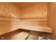 A wood sauna with built-in benches, perfect for relaxation at 7022 Tamarind Ct, Indianapolis, IN 46236