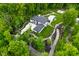 Overhead shot showcasing the elegant home with a pool and expertly maintained grounds at 7070 Dean Rd, Indianapolis, IN 46220