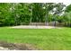 Backyard basketball court with two hoops, providing a great space for recreational activities and outdoor fun at 7070 Dean Rd, Indianapolis, IN 46220