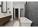 Luxurious bathroom showcasing a soaking tub and double sink at 7070 Dean Rd, Indianapolis, IN 46220