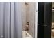 Bathroom featuring a shower with a square showerhead and a gray shower curtain at 7070 Dean Rd, Indianapolis, IN 46220