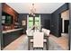 Inviting dining room with a long table, wine bar, and elegant decor at 7070 Dean Rd, Indianapolis, IN 46220