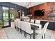 Dining room with table, chairs, wine bar, and an open doorway to the living room at 7070 Dean Rd, Indianapolis, IN 46220
