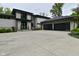 Beautiful home featuring a spacious driveway and a three-car garage at 7070 Dean Rd, Indianapolis, IN 46220