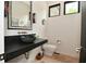 Stylish powder room with vessel sink and modern fixtures at 7070 Dean Rd, Indianapolis, IN 46220