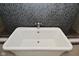 Close-up of an elegant soaking tub with sleek fixtures and tiled wall at 7070 Dean Rd, Indianapolis, IN 46220