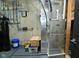 Utility room with HVAC system, water filtration, and cement walls at 7070 Dean Rd, Indianapolis, IN 46220