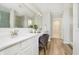 Bright bathroom features dual sinks, a large mirror, white countertops, and modern fixtures at 7145 Firestone Rd, Whitestown, IN 46075