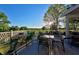 Outdoor patio dining area with views of a golf course on a sunny day at 7145 Firestone Rd, Whitestown, IN 46075