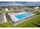 Aerial view of the community swimming pool and playground at 7145 Firestone Rd, Whitestown, IN 46075