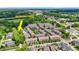 Aerial view of townhouses near the Monon Trail in a lush, green landscape at 73 11Th Nw St, Carmel, IN 46032