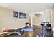 Finished basement with hardwood floors, fitness equipment and Star Wars art at 73 11Th Nw St, Carmel, IN 46032
