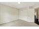 This bedroom has neutral carpet and walls with a closet at 73 11Th Nw St, Carmel, IN 46032