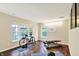 Brightly lit exercise room with hardwood floors and large windows at 73 11Th Nw St, Carmel, IN 46032