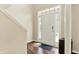Bright entryway with hardwood floors and natural light from a large window at 73 11Th Nw St, Carmel, IN 46032