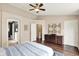 Main bedroom highlighting en-suite bathroom, closet doors and neutral-toned wall color at 73 11Th Nw St, Carmel, IN 46032