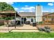 Outdoor deck area, covered seating, a grill, and a flower bed, providing an ideal space for relaxation and entertaining at 7437 Lorene Ct, Indianapolis, IN 46237
