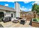 Deck area has outdoor furniture including a grill, picnic table, and outdoor fireplace at 7437 Lorene Ct, Indianapolis, IN 46237