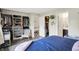 Organized main bedroom featuring custom built-in closet storage with a neutral color palette at 7437 Lorene Ct, Indianapolis, IN 46237