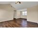 An empty bedroom featuring a window, wood floors, and a closet at 7637 Sand Run Ct, Indianapolis, IN 46259