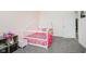 Bright bedroom with a theme, featuring a cute house frame bed and plush carpet at 7724 Dunleer Dr, Brownsburg, IN 46112